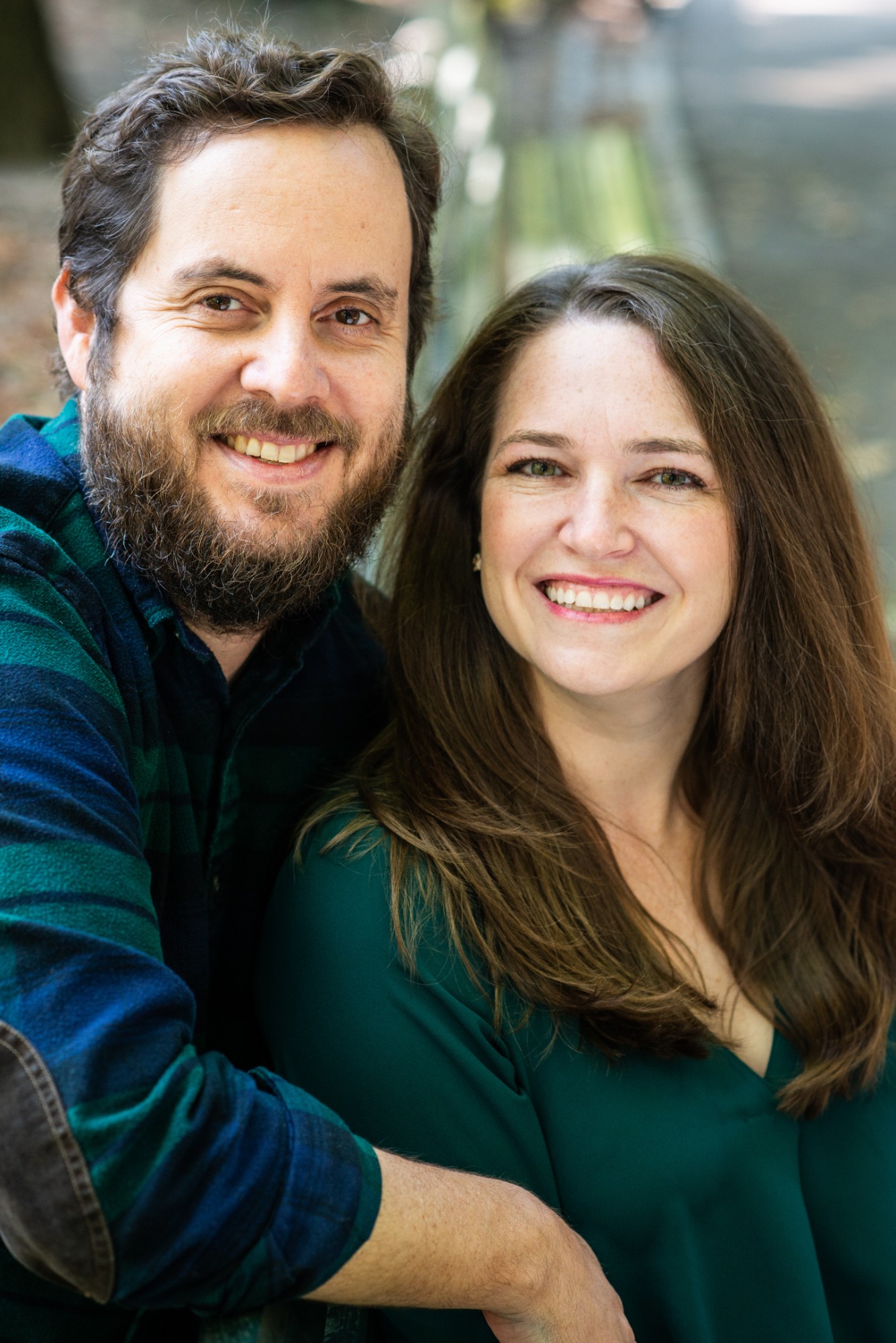 Kimberly and Stefan Palsson, the married co-founders of Fynn, smiling together outdoors